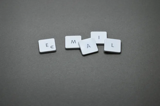 Close-up of the word 'email' formed with letter tiles on a gray surface. Marketing automation data protection: how objections travel