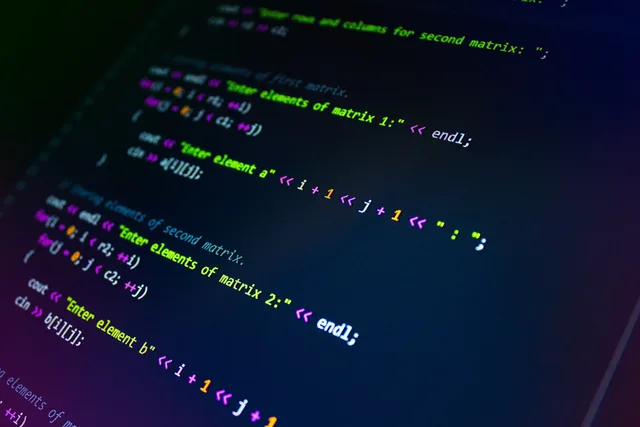 Close-up of colorful programming code displayed on a monitor screen. Marketing automation software selection: review method